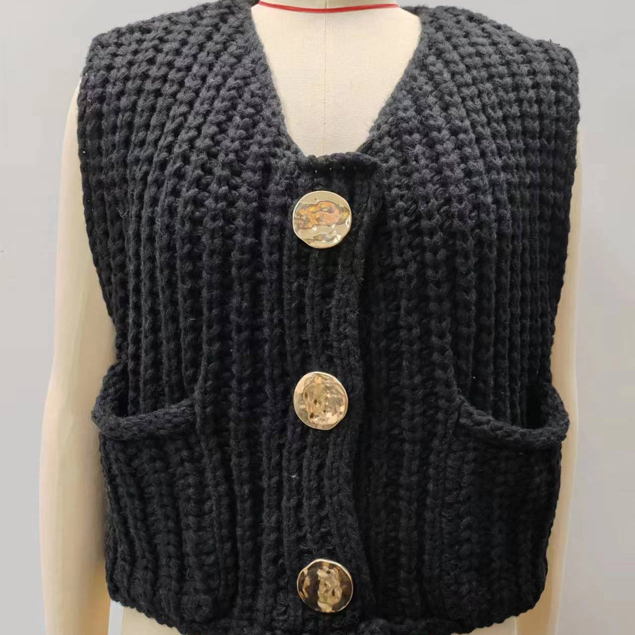 Lana™ - Mouwloos gebreid vest met zakken